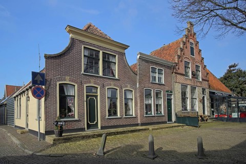 Brick houses with tail gable and stairway, Den Burg, Texel, North Holland, Holland, Netherlands