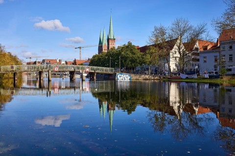 Pedestrian bridge Dankwartsbrücke, church towers of St. Petri and St. Marien, general architecture,