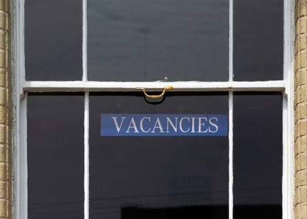 Sign in guesthouse window for Vacancies, Lowestoft, Suffolk, England, UK