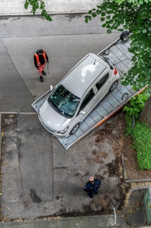 A car is towed away, parked in a zone with an absolute stopping ban, the towing service comes on