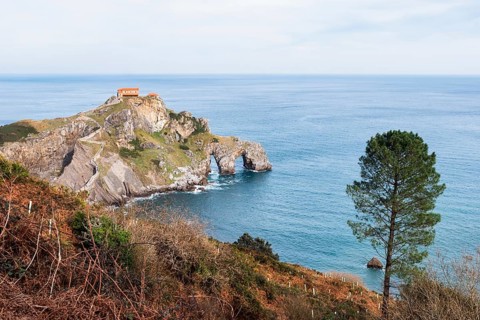 Scenic capture of Gaztelugatxe, showcasing its rugged cliffs and the historic Saint John the
