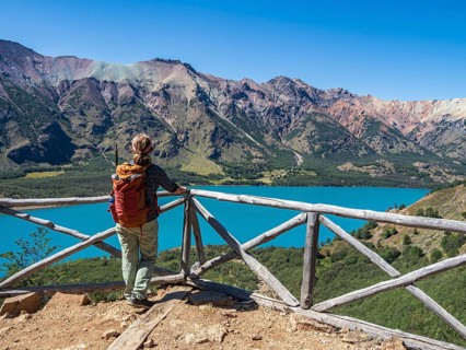Lake Lago Jeinimeni, woman at viewpoint above the lake, Jeinimeni National Park, section of Park