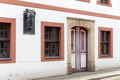 Sandstone portal and date from the Refugium im Mühlgäßchen, Sebnitz, Saxony, Germany