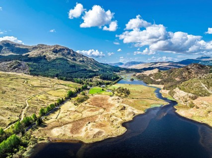 Mountains over Loch Iubhair from a drone, Crianlarich, Highlands, Scotland, United Kingdom