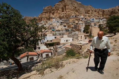 Maaloula, Syria. July 5th 2009 An old Syrian man walking in the mixed Christian and Muslim Aramaic