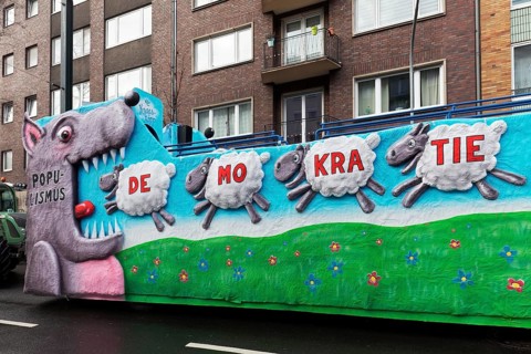 Populism wolf eats democracy sheep, political theme car, Düsseldorf Rose Monday procession,
