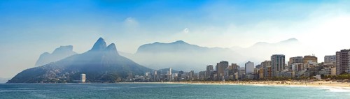Panoramic photo of Ipanema and Leblon beaches in Rio de Janeiro with the surrounding buildings and