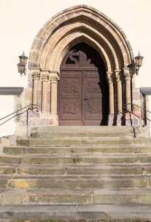 Romanesque west portal at the town church in Nossen, Saxony, Germany