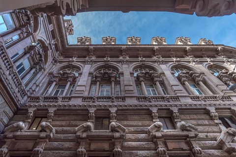 Detailed view of the courtyard façade of the Palazzo della Borsa, built between 1907 and 1912, in