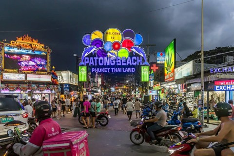 Crowds of people on Bangla Street in the evening. Nightlife on Bangla Walking Street with go-go