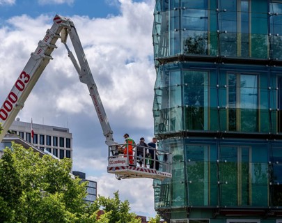 Craftsman with lifting platform, office complex at Potsdamer Platz, Berlin, Germany