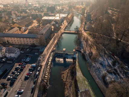 Overview of a town at dusk with river and bridge, aerial view, Nagold, Black Forest, Germany