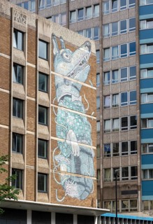 Graffiti mural artwork on building 'Wolf Boy' by Aryz, Nelson Street, Bristol, England, UK Created