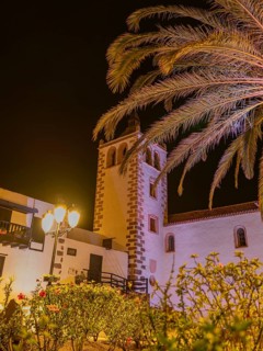 Illuminated view of the Santa Maria de Betancuria in Fuerteventura, showcasing its towering