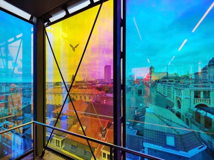 Marollescenece, art installation The Cube, coating of the windows with translucent dichroic films,
