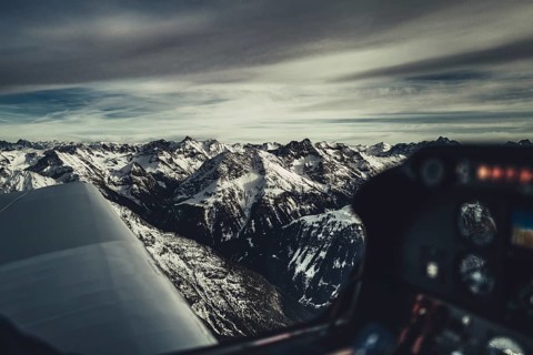 Flight over the late winter Lech Valley with a small aeroplane in Tyrol, Austria