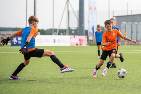 LUBIN, POLAND - SEPTEMBER 23, 2024: Football kids match during tournament Extra Class Academies