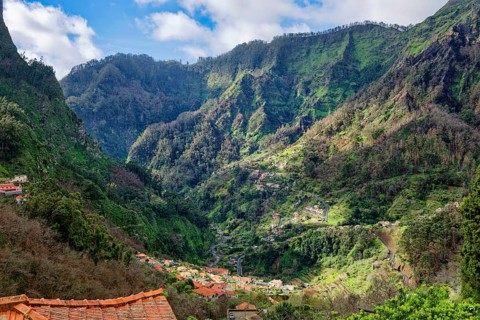 Curral das Freiras surrounded by mountains, parish of the district of Câmara de Lobos, tourist