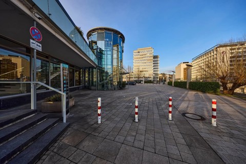 Congresshalle Saarbrücken, modern architecture, commercial building, bollards, evening light, blue