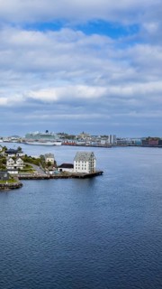 Alesund, port town in Norway famous for Art Nouveau architecture, fjords and scenic landscapes