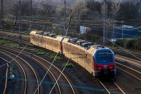 Regional express train on the tracks, railway layout, railway line west of the main station of
