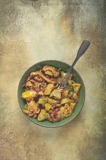 Fried green tomatoes, with onions and spices, green tomato appetizer, Georgian cuisine, homemade,
