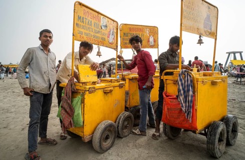 Vendor sells Kulfi on the bank of Brahmaputra river on Ashoka Ashtami mela during Chaitra Navratri