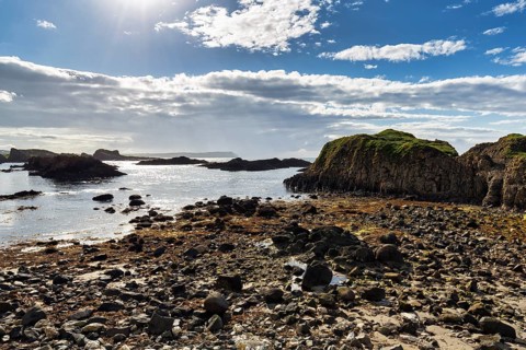 Pristine rocky coastline, coastline, sunbeams, Ballintoy Harbour, Causeway Coastal Route, Antrim,