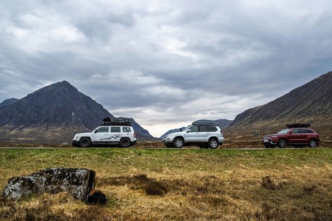 4x4 cars in Glen Etive Valley, Highlands, Scotland, UK
