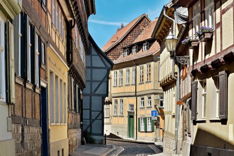 Narrow alley with half-timbered houses and cobblestones in the historic old town, UNESCO World