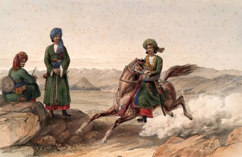 A man rides a horse while two others watch, in a vast landscape