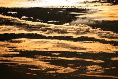 Sun behind clouds
