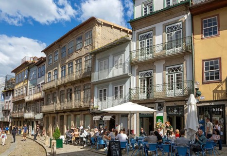 Historic medieval buildings in city centre, Rua Rainha Dona Maria I, Guimaraes, northern Portugal