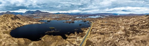 Panorama of Rannoch Moor from a drone over Loch Ba and Loch of the Armpit, A82 Highland Way, Argyll