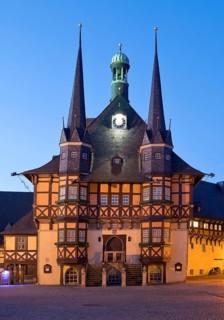 Market square with atmospherically illuminated town hall in the evening, Wernigerode, Harz,