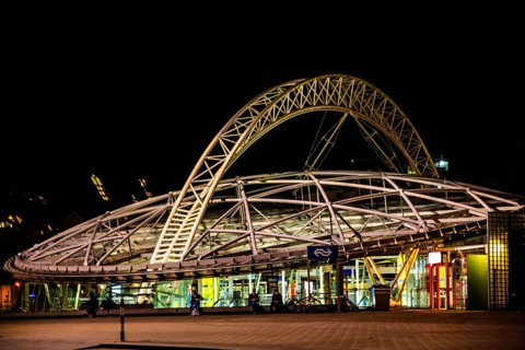 Rotterdam Blaak railway station at night, city panorama, Rotterdam, Netherlands