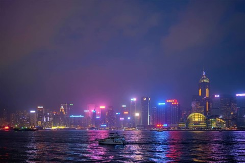HONG KONG, CHINA, APRIL 28, 2018: Hong Kong skyline cityscape downtown skyscrapers over Victoria