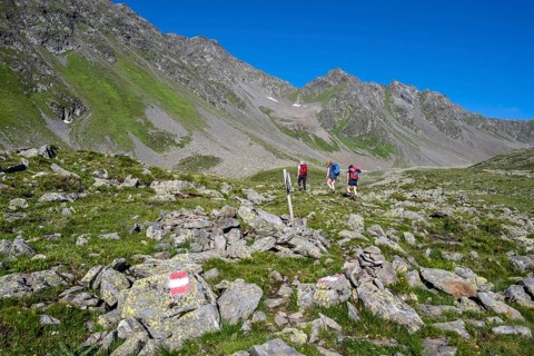 Three hikers in the Alps, Lasörling High Trail, Lasörling Group, Hohe Tauern National Park, East