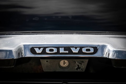 Chromed trunk handle with Volvo lettering, vintage car, black Volvo Amazon, medium class car from