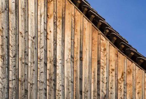 Symbolic photo, building is clad in larch wood, Hesse, Germany