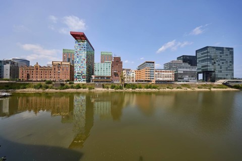 Modern architecture with reflections on the water surface in Düsseldorf Media Harbour, state