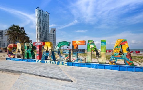 Cartagena, Colombia – 18 December, 2019: Big welcoming Cartagena letters on a public beach near the