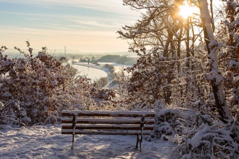 Sunrise at the Scharfenberg viewpoint on a winter morning, view of the Elbe valley as far as
