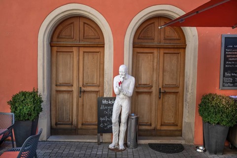 Reflective sculpture in front of the entrance to the museum café, Martin-Luther-Platz 1,