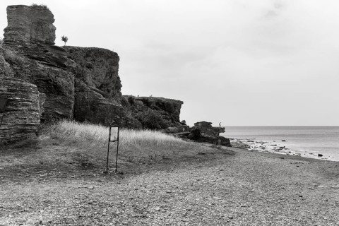 Cliffs made of reef limestone, distinctive coastline, hikers, monochrome, Hoburgen, south of the