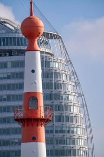 Skyline of Bremerhaven, Atlantic Sail City Hotel skyscraper, front light Bremerhaven, a red and