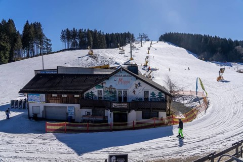 Winter sports area in the Sauerland, Winterberg ski lift carousel, artificial snow slopes,