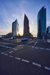 High-rise buildings Forum Tower and Kollhoff Tower in the backlight at Potsdamer Platz in Berlin,