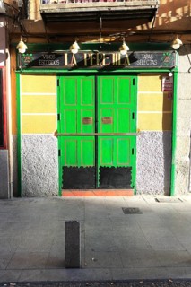 Bright green doors La Perejila, Calle Cava Baja, La Latina, Madrid, Spain