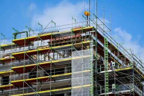 Essen, North Rhine-Westphalia, Germany - Scaffolding on the new building site of a high-rise block